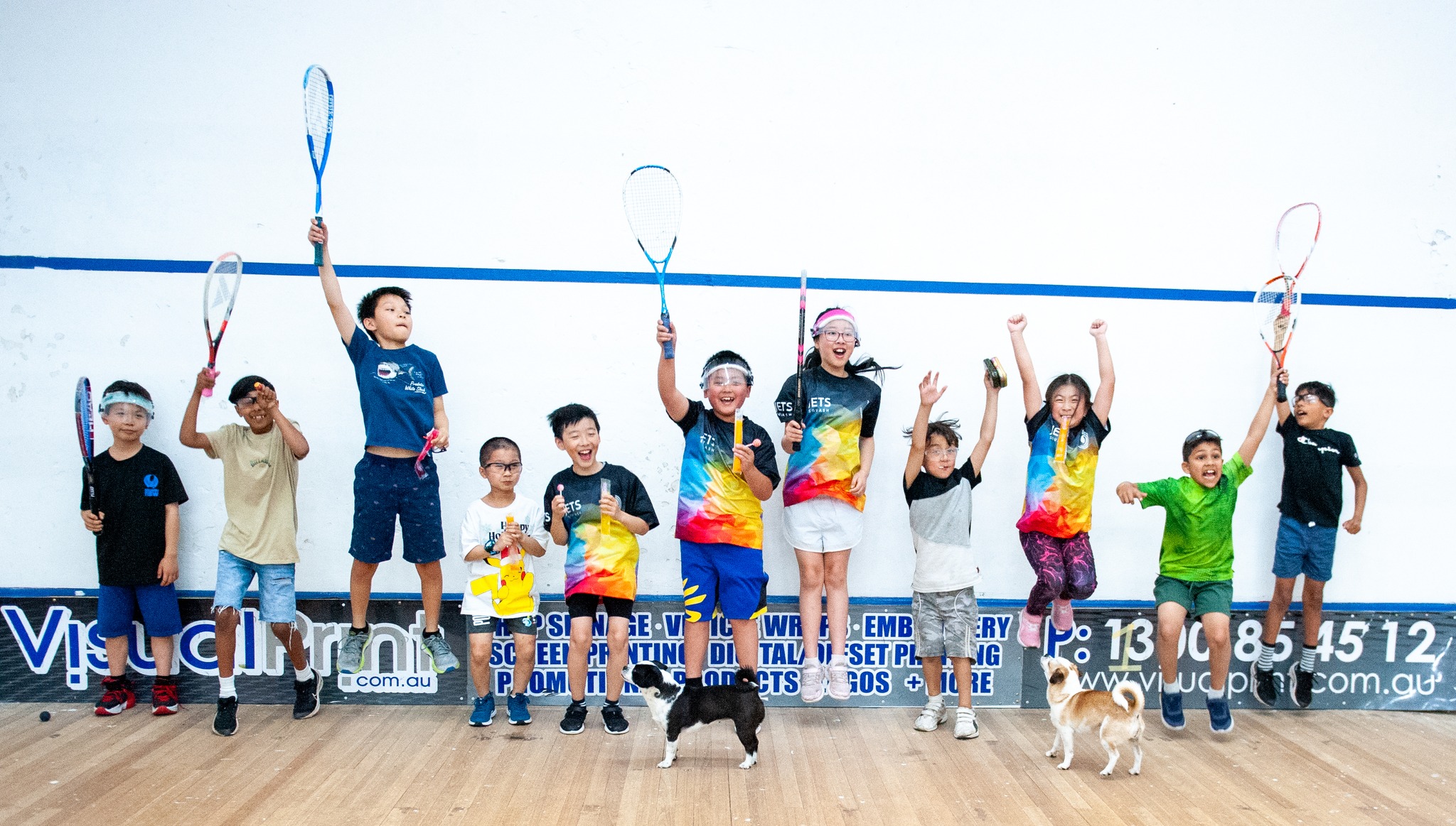 JETS juniors celebrating on court