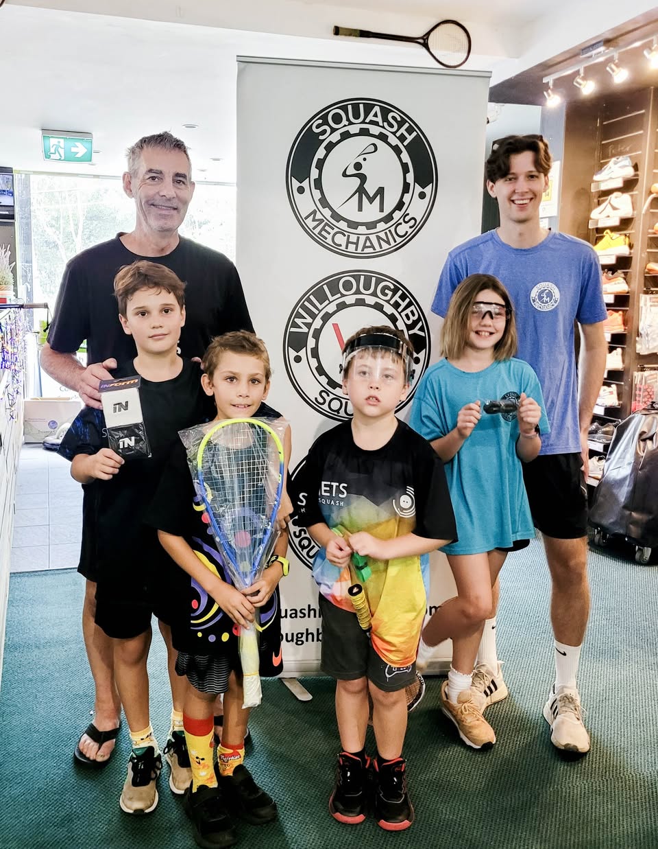 Coach with young players at MAASH