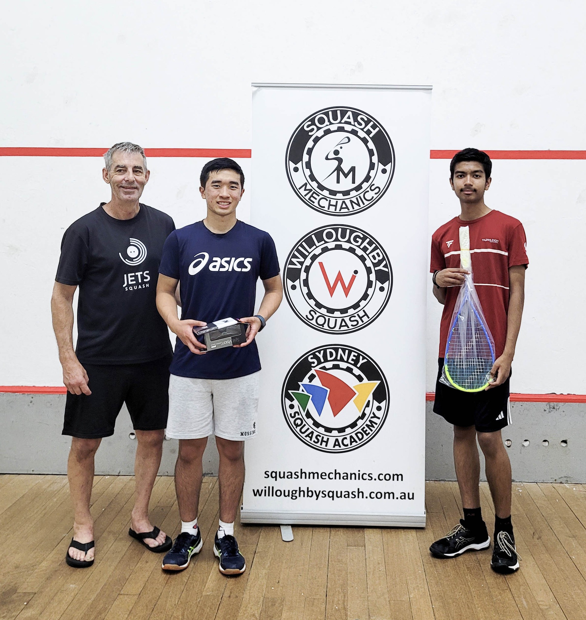 Coach Geoff with players at tournament